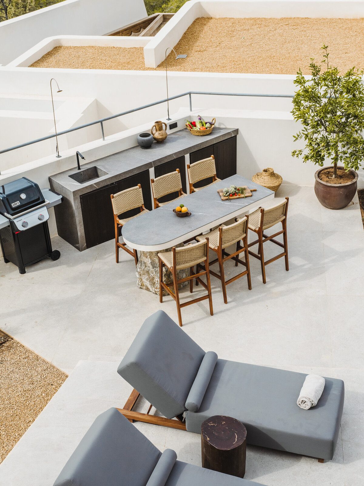 Outdoor kitchen and dining terrace